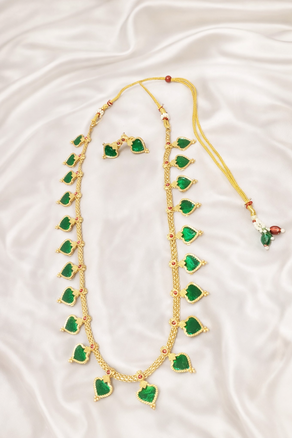 #LC1123 Green Heart Stone Haram With Red Accent Stone Set